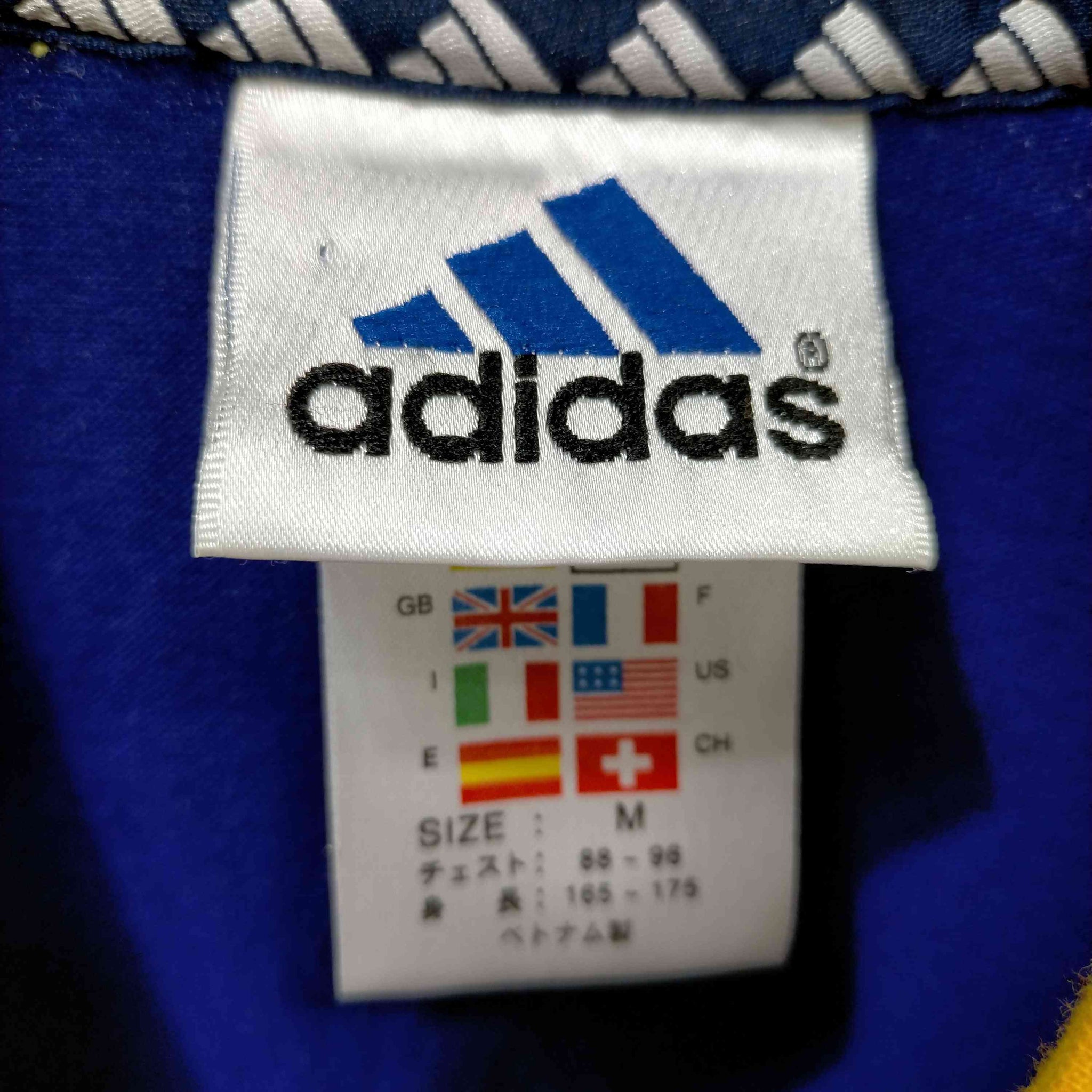 adidas(アディダス)万国旗タグバイカラークルーネックTシャツ