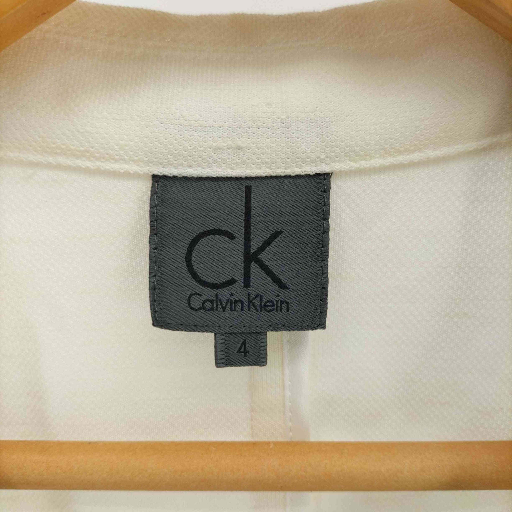 ck Calvin Klein(シーケーカルバンクライン)ポリ リネン センタータック 1B テーラード ジャケット スカート セットアップ